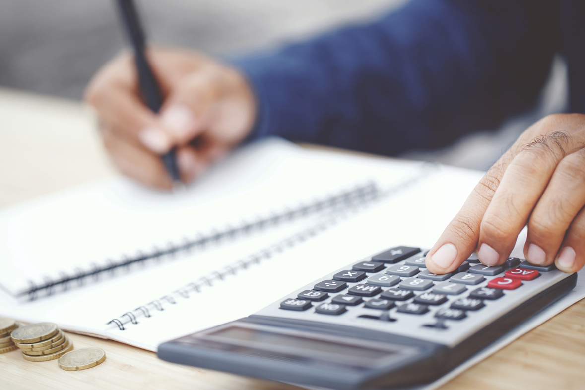 Accountant Calculating Financial Statements